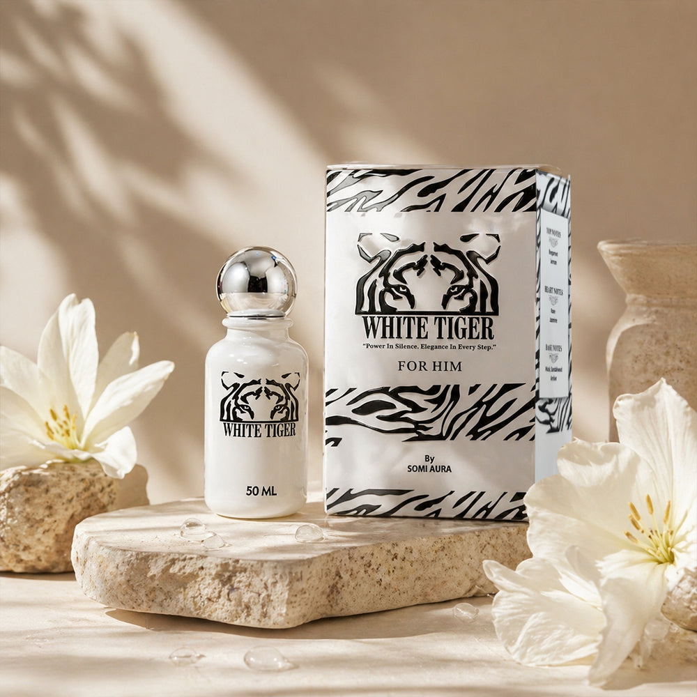 White Tiger perfume bottle and packaging on a stone surface with flowers